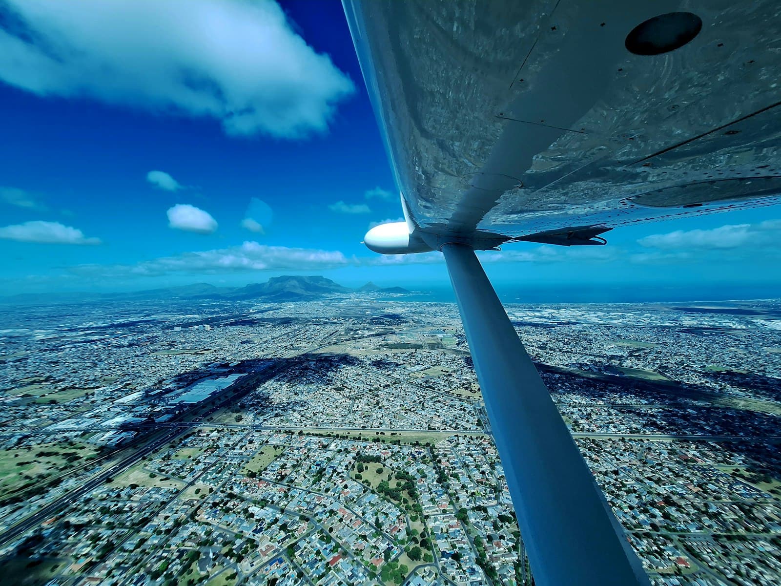 A city seen from an aircraft on approach